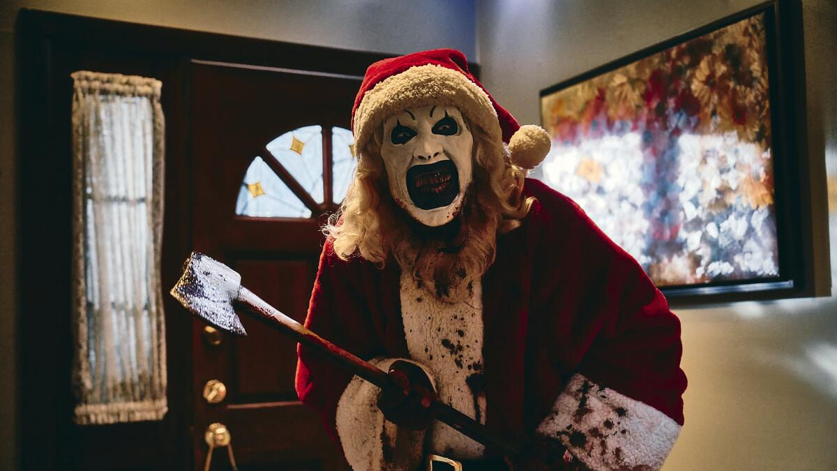 How Merry Gore Of &amp;#039;Terrifier 3&amp;#039; Beat &amp;#039;Joker&amp;#039; At Box Office - Los pertaining to Masked Mimes Associated with Christmas Crossword